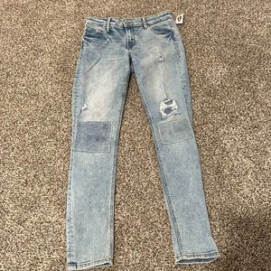 Light blue high rise ripped/patch skinny jeans